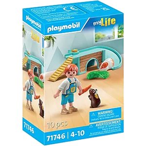 Enfant Avec Cochons D'inde Et Aire De Jeux